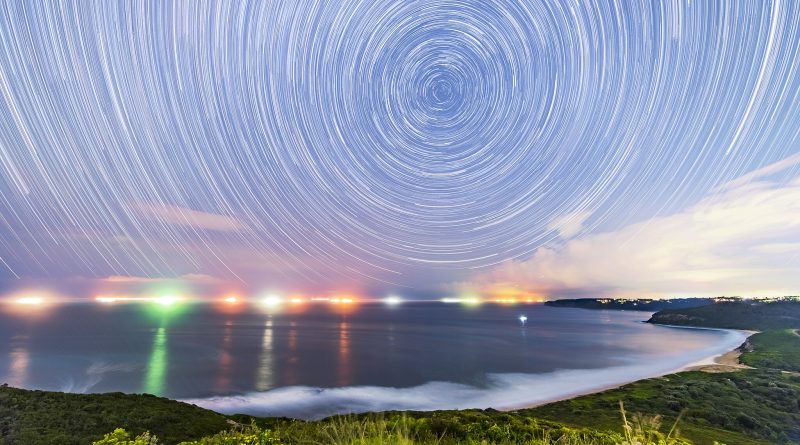 Photo taken with a long exposure, capturing early evening stars over the ocean at Glenrock Conservation Area.